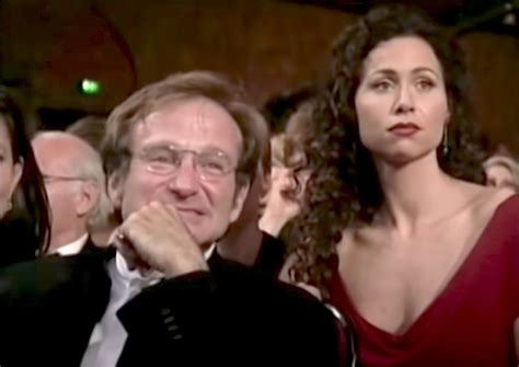 Sad Minnie Driver watching Matt Damon and Ben Affleck receive。